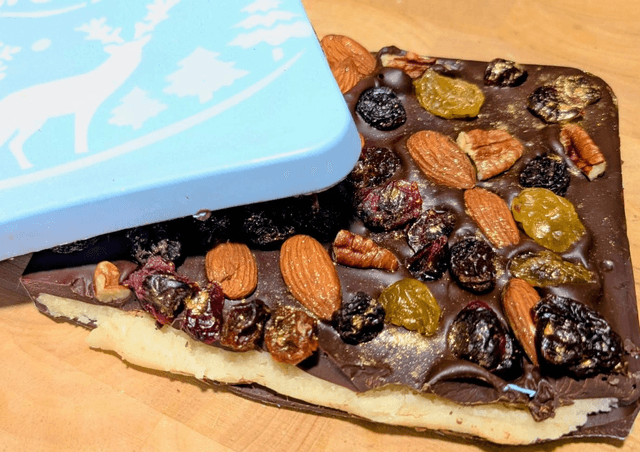 Giant, 750g dark chocolate bar, filled with marzipan and topped with festive fruits and nuts